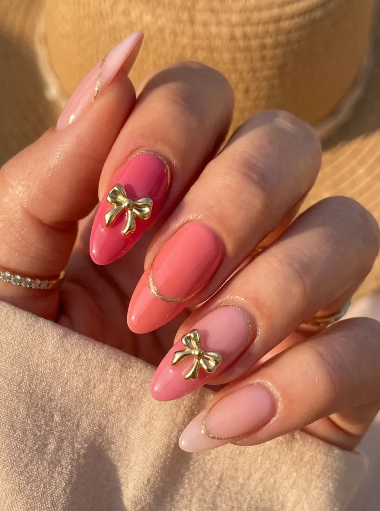Rosa Mandelnägel in zarten bis kräftigen Pinktönen, feminines Sommer-Nageldesign mit glänzendem Finish